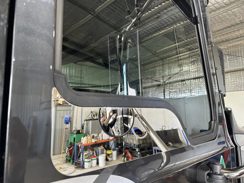 Pair of Stainless Steel Door Under Window Trims to Suit a Mack Anthem